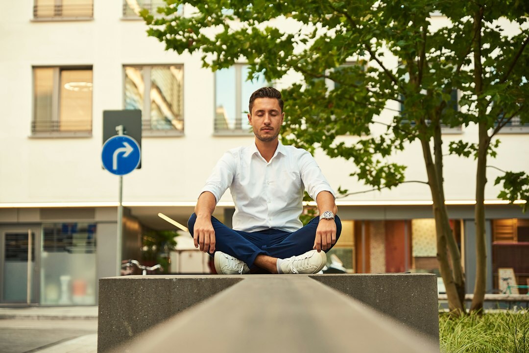 person meditating at work