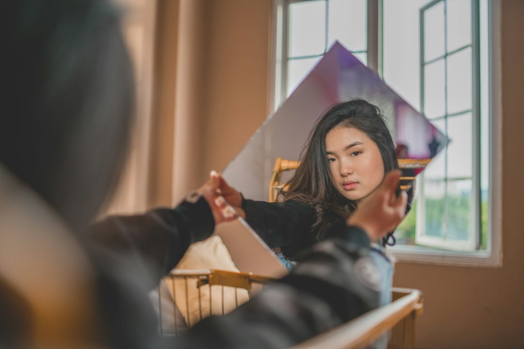 person practicing speech in mirror