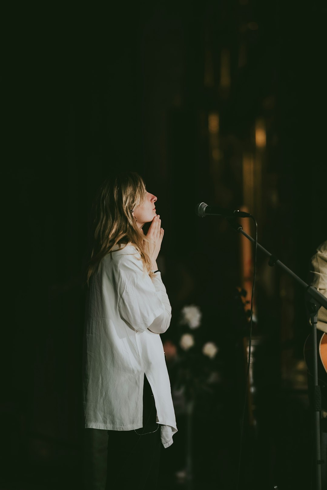 person speaking on stage confidently